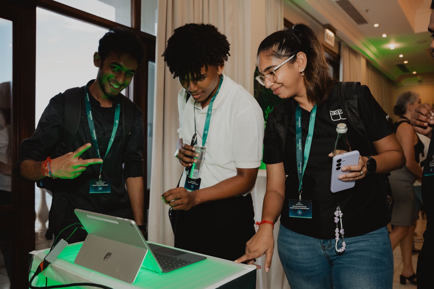 Colleagues exploring a device together