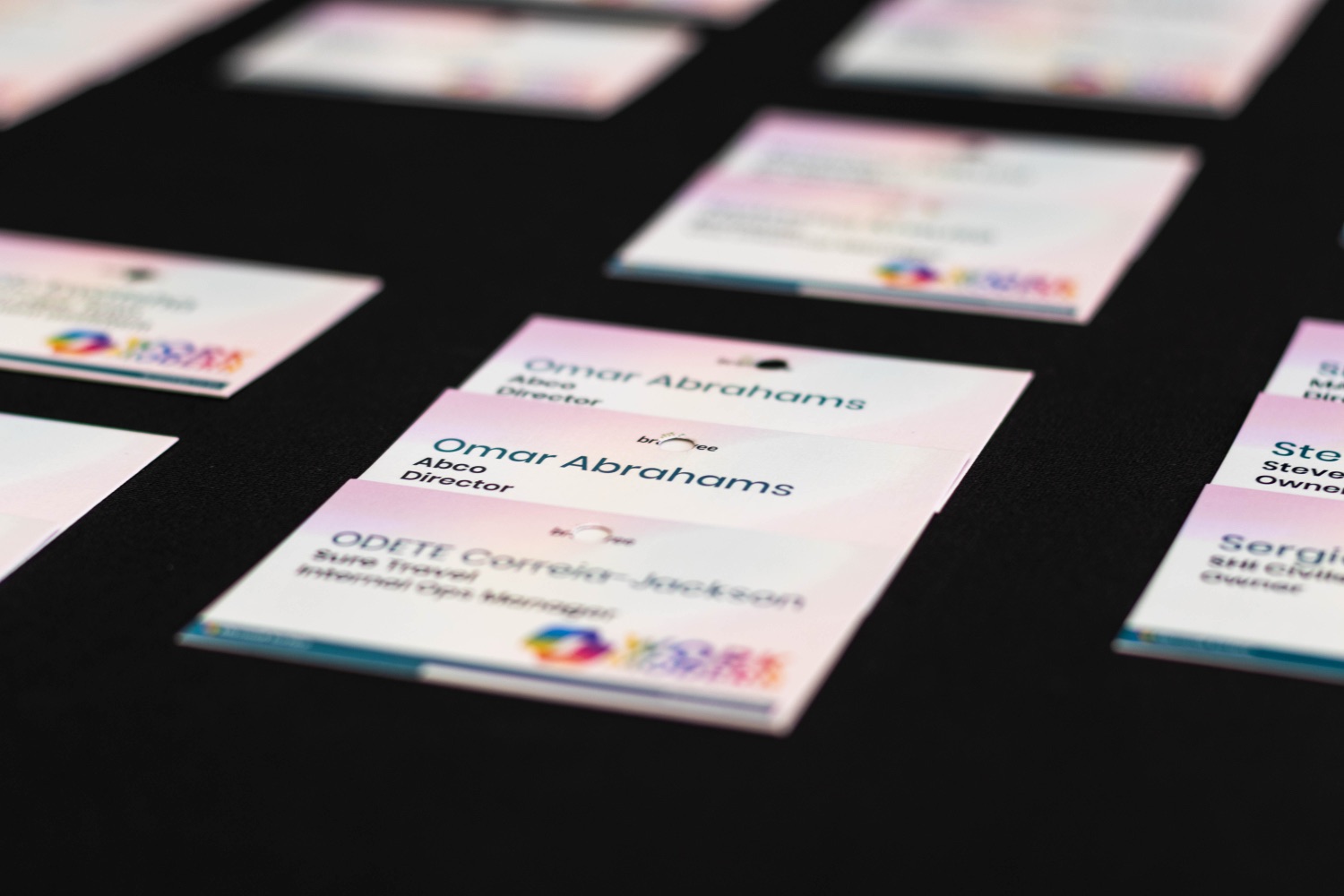 Printed name cards laid out on the welcome table