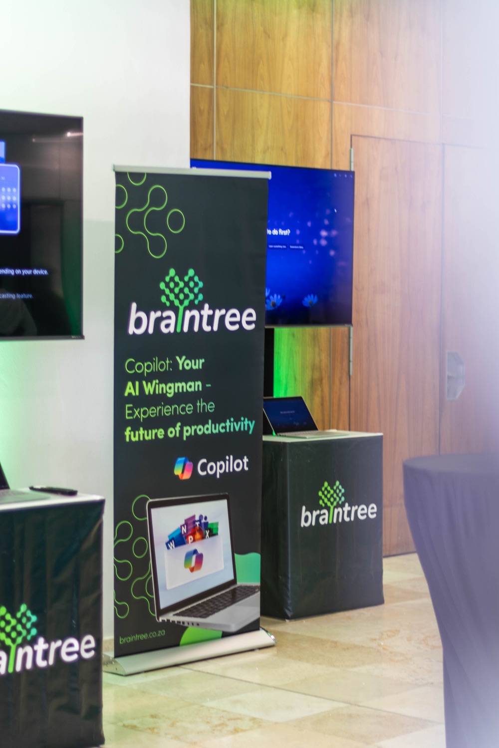 A Braintree Copilot demo stand showcasing productivity tools