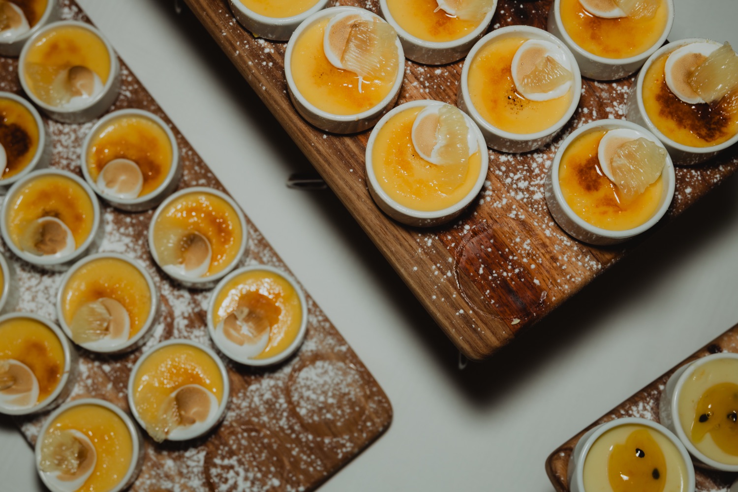 Dessert canapes plated on a wooden board