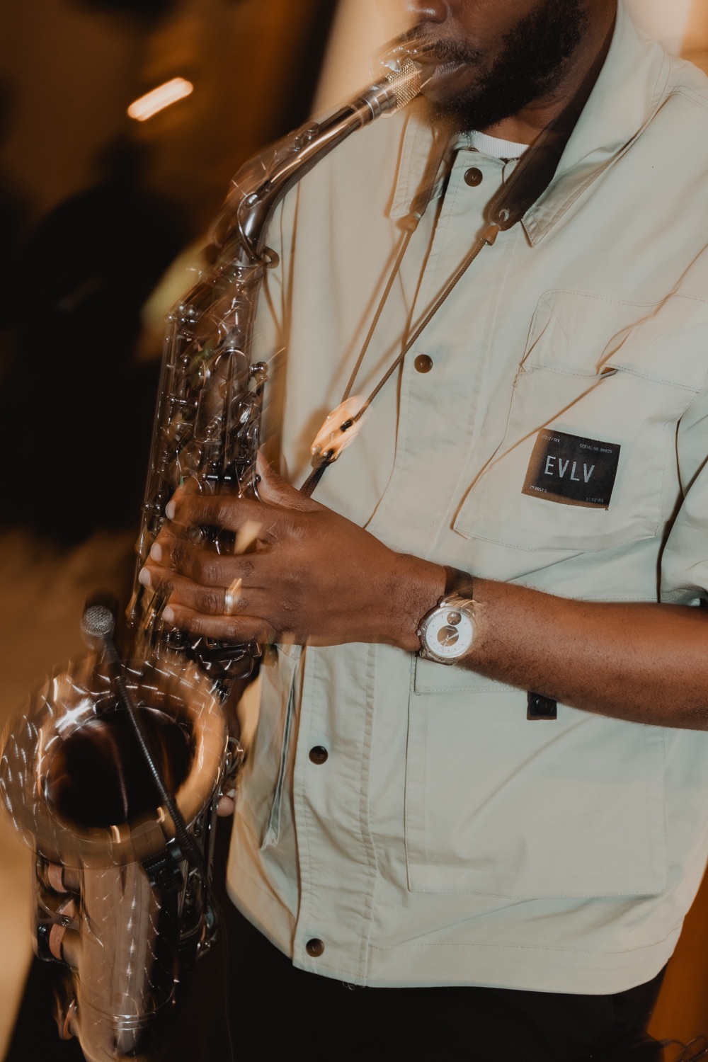 A saxophonist performing live entertainment at the event