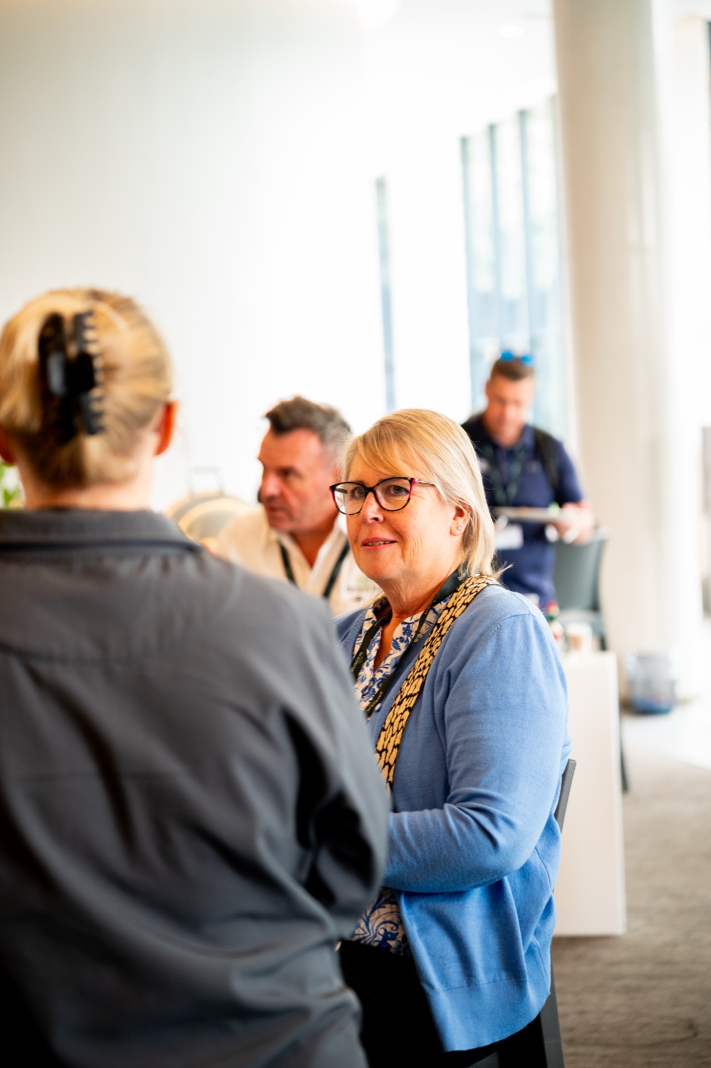 Two guests in conversation during the networking break