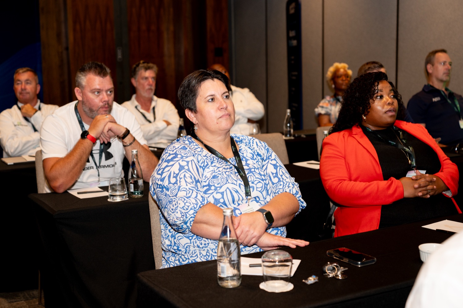 Guests listening and engaged during a session