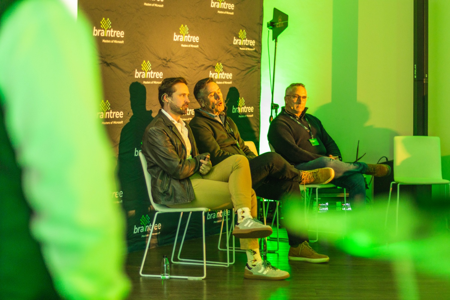 Panellists in conversation on stage during the session